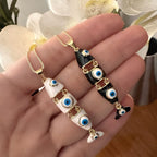 Cadena fish evil eye black o white.